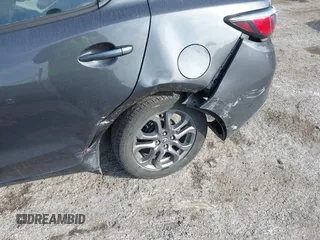 2019 Toyota Yaris Sedan L with VIN 3MYDLBYVXKY506966, listed as a IAAI auction lot 41455800 with 106,284 mi miles. Bid and sale history available at carsss.com. Image 17.