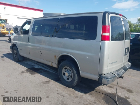 2005 Chevrolet Express Passenger with VIN 1GAHG35U151169241, listed as a IAAI auction lot 42586648 with 385,258 mi miles and . Bid and sale history available at DreamBid. Image 3.