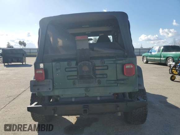 2001 Jeep Wrangler SE with VIN 1J4FA29P71P329199, listed as a Copart auction lot 48144035 with 114,904 mi miles and Salvage Title. Bid and sale history available at carsss.com. Image 6.