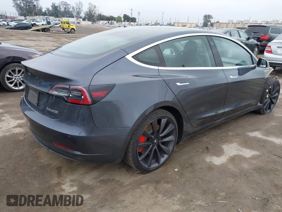 2020 Tesla Model 3 Performance z VIN 5YJ3E1EC3LF802068, wystawiony jako IAAI lot #41886024 z przebiegiem 50 271 mil mil oraz . Historia ofert i sprzedaży dostępna na DreamBid. Obrazek 4.