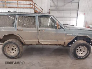 1998 Jeep Cherokee Sport with VIN 1J4FJ68S5WL284937, listed as a IAAI auction lot 41984490 with 259,716 mi miles and . Bid and sale history available at DreamBid. Image 14.