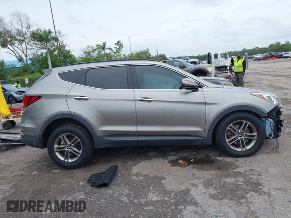 2017 Hyundai Santa Fe 2.4L with VIN 5NMZU3LB2HH014844, listed as a IAAI auction lot 42657624 with 93,533 mi miles and . Bid and sale history available at DreamBid. Image 14.