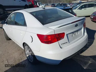 2013 Kia Forte SX with VIN KNAFW4A36D5663328, listed as a IAAI auction lot 41294354 with 172,637 mi miles. Bid and sale history available at carsss.com. Image 3.