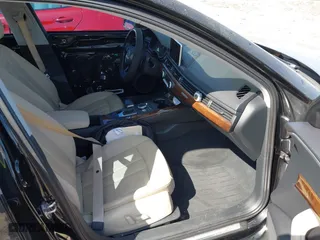 2017 Audi A4 Premium with VIN WAUANAF4XHN006700, listed as a IAAI auction lot 41886496 with 64,758 mi miles. Bid and sale history available at carsss.com. Image 5.