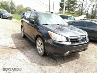 2014 Subaru Forester 2.5i Premium with VIN JF2SJAEC1EH477920, listed as a IAAI auction lot 41974390 with 145,837 mi miles. Bid and sale history available at carsss.com. Image 1.