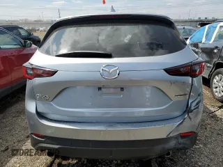 2023 Mazda CX-5 S Premium with VIN JM3KFBDM8P0203834, listed as a Copart auction lot 52496815 with 54,306 mi miles and Non Repairable. Bid and sale history available at DreamBid. Image 6.