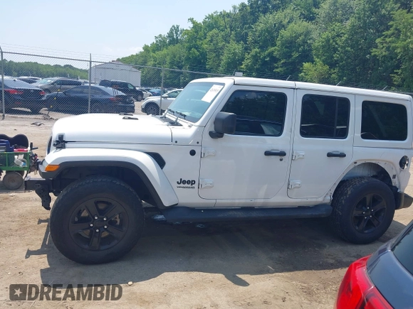2021 Jeep Wrangler Unlimited Sahara with VIN 1C4HJXEN1MW618508, listed as a IAAI auction lot 42639515 with 39,747 mi miles and . Bid and sale history available at DreamBid. Image 14.