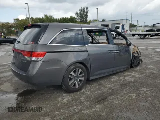 2015 Honda Odyssey Touring Elite with VIN 5FNRL5H90FB129008, listed as a Copart auction lot 47995945 with Not provided miles and Non repairable. Bid and sale history available at DreamBid. Image 3.