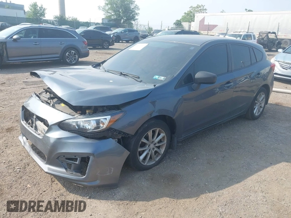 2018 Subaru Impreza with VIN 4S3GTAA63J3748319, listed as a IAAI auction lot 42441310 with 71,616 mi miles and . Bid and sale history available at DreamBid. Image 2.