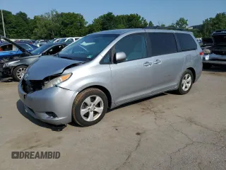 2014 Toyota Sienna LE AAS with VIN 5TDKK3DC0ES520146, listed as a Copart auction lot 66308655 with 179,207 mi miles and Salvage title. Bid and sale history available at DreamBid. Image 1.