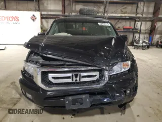 2010 Honda Ridgeline RTL with VIN 5FPYK1F5XAB011944, listed as a Copart auction lot 52434175 with 137,585 mi miles and Salvage title. Bid and sale history available at DreamBid. Image 5.