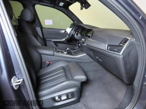 2022 BMW X5 sDrive40i with VIN 5UXCR4C00N9L79444, listed as a Copart auction lot 43563295 with 66,896 mi miles and Clean Title. Bid and sale history available at carsss.com. Image 5.