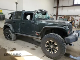 2012 Jeep Wrangler Unlimited Rubicon with VIN 1C4HJWFG4CL119390, listed as a Copart auction lot 60026425 with 305,189 mi miles and Salvage title. Bid and sale history available at DreamBid. Image 4.
