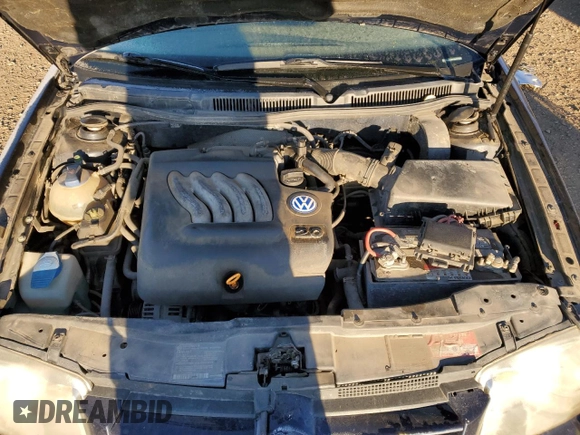 2000 Volkswagen Jetta GLS z VIN 3VWSA29M7YM057356, wystawiony jako Copart lot #76960844 z przebiegiem 299 410 mil mil oraz Szkoda całkowita • Salvage title. Historia ofert i sprzedaży dostępna na DreamBid. Obrazek 11.
