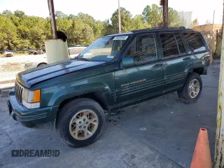 1998 Jeep Grand Cherokee Limited with VIN 1J4GZ78Y8WC261353, listed as a Copart auction lot 76605944 with 156,883 mi miles and Salvage Title. Bid and sale history available at carsss.com. Image 1.