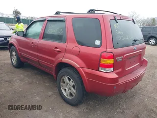 2005 Ford Escape Limited with VIN 1FMYU94155KA52665, listed as a IAAI auction lot 41736416 with 999,999 mi miles. Bid and sale history available at carsss.com. Image 3.