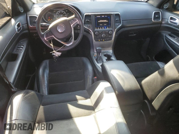 2018 Jeep Grand Cherokee Altitude with VIN 1C4RJFAGXJC296051, listed as a Copart auction lot 53450135 with 65,838 mi miles and Salvage title. Bid and sale history available at DreamBid. Image 8.