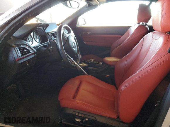 2016 BMW 2 Series 228i with VIN WBA1K9C53GV710823, listed as a Copart auction lot 84087434 with 70,822 mi miles and Salvage Title. Bid and sale history available at carsss.com. Image 7.