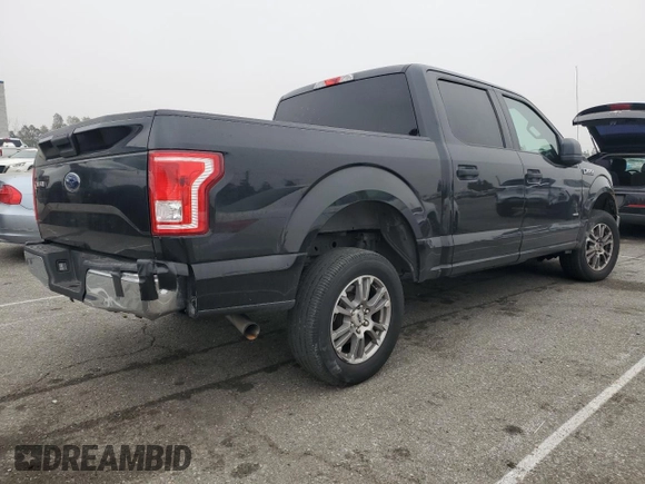 2015 Ford F-150 XL with VIN 1FTEW1CG0FKD03070, listed as a Copart auction lot 52990475 with 102,844 mi miles and Salvage title. Bid and sale history available at DreamBid. Image 3.