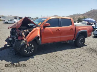2017 Toyota Tacoma SR5 with VIN 3TMAZ5CN0HM031045, listed as a Copart auction lot 63715935 with 114,127 mi miles and Salvage title. Bid and sale history available at DreamBid. Image 1.