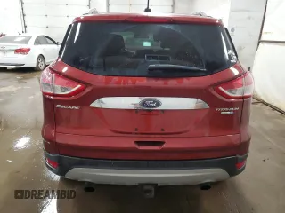 2016 Ford Escape Titanium with VIN 1FMCU9J95GUC57205, listed as a Copart auction lot 71033934 with 90,477 mi miles and Salvage Title. Bid and sale history available at DreamBid. Image 6.