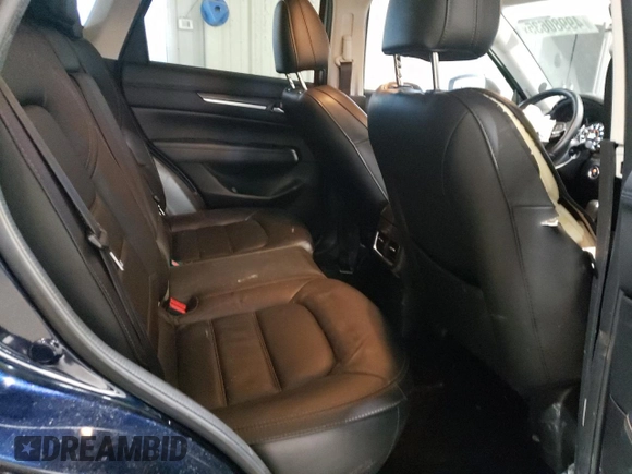 2021 Mazda CX-5 Grand Touring with VIN JM3KFBDM3M0327635, listed as a Copart auction lot 49980635 with 47,160 mi miles and Salvage Title. Bid and sale history available at carsss.com. Image 11.