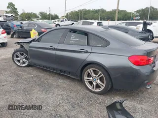 2017 BMW 4 Series 430i z VIN WBA4F7C57HG786475, wystawiony jako IAAI lot #42619080 z przebiegiem 88 784 mil mil oraz . Historia ofert i sprzedaży dostępna na DreamBid. Obrazek 3.