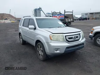 2009 Honda Pilot Touring z VIN 5FNYF488X9B012271, wystawiony jako IAAI lot #42162275 z przebiegiem 205 281 mil mil oraz . Historia ofert i sprzedaży dostępna na DreamBid. Obrazek 1.