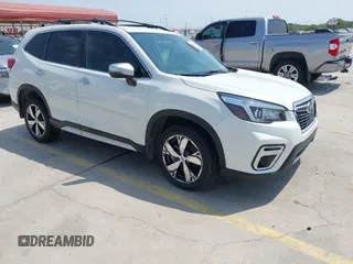 2019 Subaru Forester Touring with VIN JF2SKAWC2KH595689, listed as a IAAI auction lot 42326047 with 69,676 mi miles and . Bid and sale history available at DreamBid. Image 1.