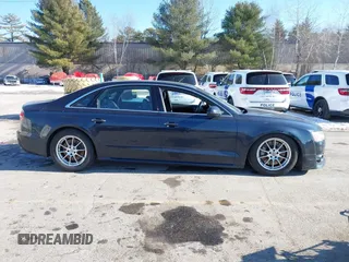 2017 Audi A8 L Sport with VIN WAU43AFDXHN003685, listed as a IAAI auction lot 41264314 with 114,828 mi miles. Bid and sale history available at carsss.com. Image 13.