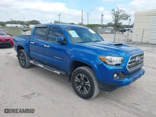 2017 Toyota Tacoma SR5 with VIN 5TFAZ5CN8HX036312, listed as a IAAI auction lot 41606318 with 63,349 mi miles. Bid and sale history available at carsss.com. Image 1.