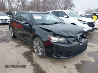 2012 Scion tC with VIN JTKJF5C72C3024241, listed as a IAAI auction lot 41750123 with 136,695 mi miles. Bid and sale history available at carsss.com. Image 1.