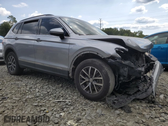 2020 Volkswagen Tiguan SE with VIN 3VV2B7AX4LM022562, listed as a Copart auction lot 69816034 with 61,789 mi miles and Salvage Title. Bid and sale history available at DreamBid. Image 4.