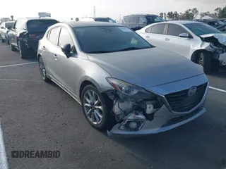 2014 Mazda 3 S Grand Touring with VIN JM1BM1M35E1197272, listed as a IAAI auction lot 42564813 with Not provided miles and . Bid and sale history available at DreamBid. Image 1.