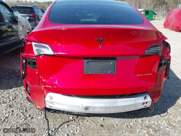 2023 Tesla Model Y Long Range with VIN 7SAYGDEE6PA040783, listed as a IAAI auction lot 41878236 with 32,436 mi miles. Bid and sale history available at carsss.com. Image 6.