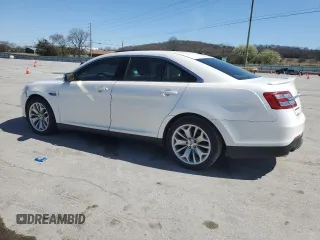 2013 Ford Taurus Limited z VIN 1FAHP2F8XDG202743, wystawiony jako Copart lot #48457145 z przebiegiem 161 331 mil mil oraz Szkoda całkowita • Salvage title. Historia ofert i sprzedaży dostępna na DreamBid. Obrazek 2.
