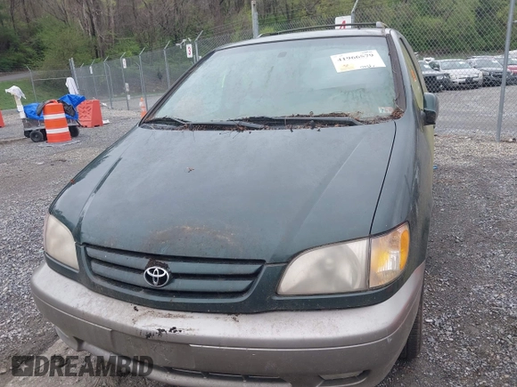 2001 Toyota Sienna LE with VIN 4T3ZF13C71U351289, listed as a IAAI auction lot 41966579 with 254,740 mi miles. Bid and sale history available at carsss.com. Image 6.