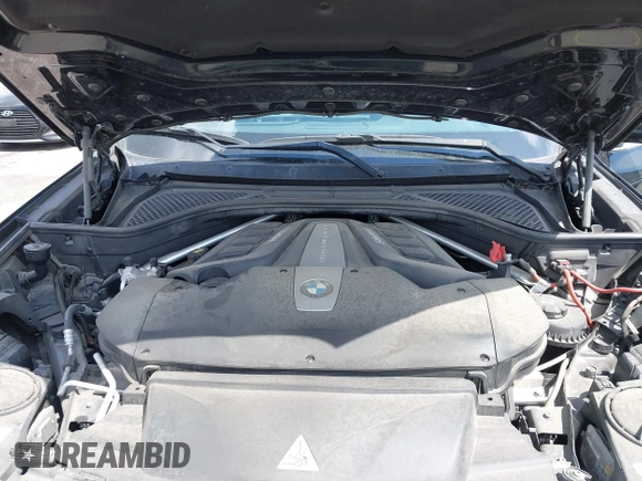 2016 BMW X5 xDrive50i with VIN 5UXKR6C51G0J81658, listed as a IAAI auction lot 41801382 with 34,572 mi miles. Bid and sale history available at carsss.com. Image 10.