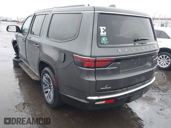 2022 Jeep Wagoneer Series III with VIN 1C4SJVDT3NS142233, listed as a IAAI auction lot 41477654 with 74,170 mi miles and . Bid and sale history available at DreamBid. Image 3.