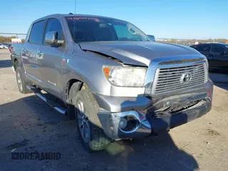 2012 Toyota Tundra 4WD Truck LTD with VIN 5TFHW5F18CX251584, listed as a IAAI auction lot 41054238 with 124,892 mi miles. Bid and sale history available at carsss.com. Image 1.