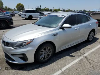 2019 Kia Optima LX z VIN 5XXGT4L31KG363380, wystawiony jako Copart lot #63094645 z przebiegiem 110 518 mil mil oraz Czysty tytuł • Clean title. Historia ofert i sprzedaży dostępna na DreamBid. Obrazek 1.
