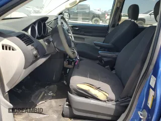 2008 Dodge Grand Caravan SE with VIN 2D8HN44H08R677094, listed as a Copart auction lot 66573804 with 210,318 mi miles and Clean Title. Bid and sale history available at DreamBid. Image 7.