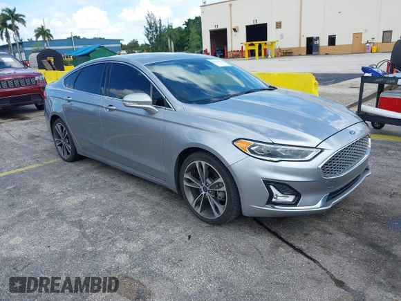 2020 Ford Fusion Titanium with VIN 3FA6P0D95LR199443, listed as a IAAI auction lot 42721371 with 77,592 mi miles and . Bid and sale history available at DreamBid. Image 1.