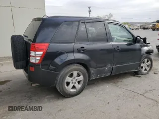 2009 Suzuki Grand Vitara with VIN JS3TE044094100649, listed as a Copart auction lot 52033855 with 137,460 mi miles and Salvage title. Bid and sale history available at DreamBid. Image 3.