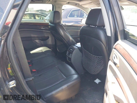 2011 Cadillac SRX Premium Collection z VIN 3GYFNCEY5BS597566, wystawiony jako IAAI lot #41983784 z przebiegiem 102 989 mil mil oraz . Historia ofert i sprzedaży dostępna na DreamBid. Obrazek 8.