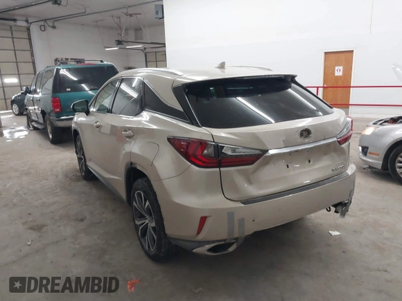 2019 Lexus RX with VIN 2T2BZMCA9KC200194, listed as a IAAI auction lot 41595521 with 70,038 mi miles. Bid and sale history available at carsss.com. Image 3.