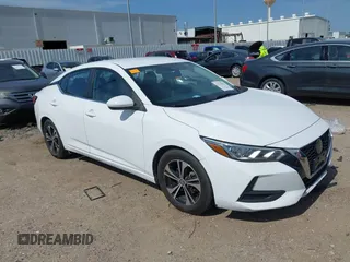 2021 Nissan Sentra SV z VIN 3N1AB8CV4MY242440, wystawiony jako IAAI lot #42249041 z przebiegiem 100 332 mil mil oraz . Historia ofert i sprzedaży dostępna na DreamBid. Obrazek 1.