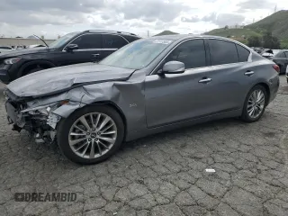 2019 Infiniti Q50 Luxe z VIN JN1EV7AP6KM513800, wystawiony jako Copart lot #51117555 z przebiegiem 92 337 mil mil oraz Szkody całkowita. Historia ofert i sprzedaży dostępna na DreamBid. Obrazek 1.