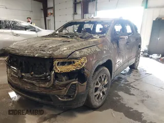 2020 GMC Acadia SLT with VIN 1GKKNMLSXLZ111304, listed as a IAAI auction lot 41267103 with Not Provided miles and . Bid and sale history available at DreamBid. Image 2.