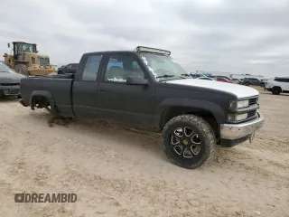 1994 GMC Sierra 1500 z VIN 2GTEK19K7R1531515, wystawiony jako Copart lot #45211685 z przebiegiem 286 840 mil mil oraz Szkoda całkowita • Salvage title. Historia ofert i sprzedaży dostępna na DreamBid. Obrazek 4.